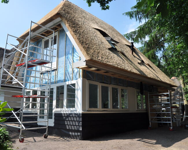 Luxe HSB woning met rieten kap - Van den Berg Houtbouw